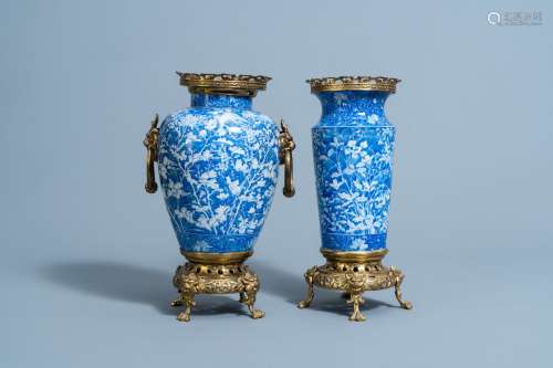 Two Japanese blue and white gilt brass mounted Arita vases, ...