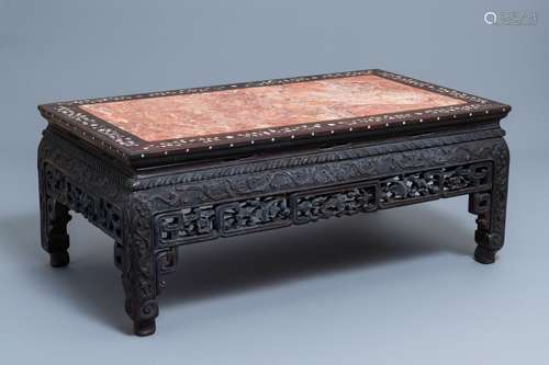 A Chinese mother-of-pearl inlaid wooden low side table with ...