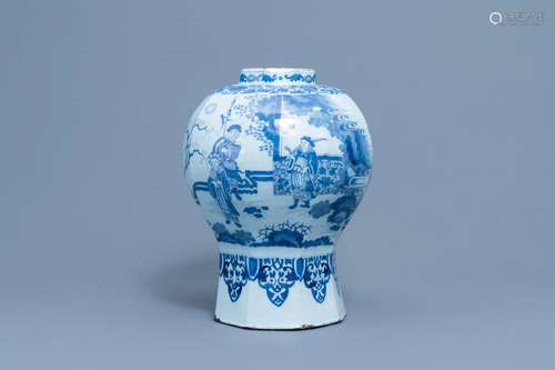 A large Dutch Delft blue and white 'chinoiserie' baluster va...