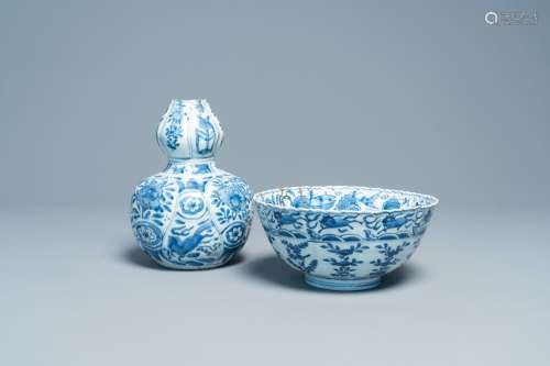 A Chinese blue and white 'flying horses' bowl and a double g...