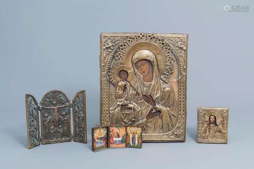 Two Russian icons with copper oklad or riza and two travel i...