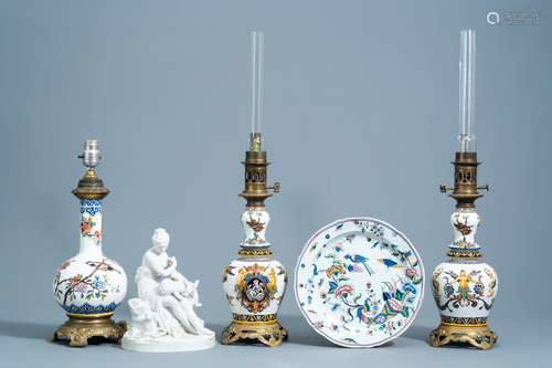 Three French polychrome Gien vases mounted as lamps, a plate...