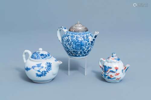 Two Chinese blue and white teapots and an Imari style teapot...