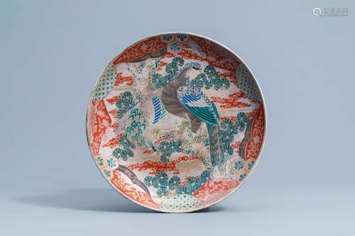 A Japanese Kutani charger with a bird of prey, Meiji, 19th C...