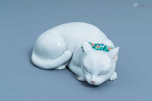 A Japanese Kutani sleeping recumbent cat figure, Meiji/Taish...