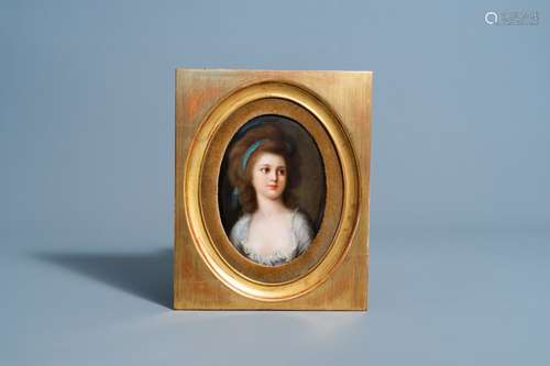 An oval framed porcelain plaque with the portrait of Anna Po...