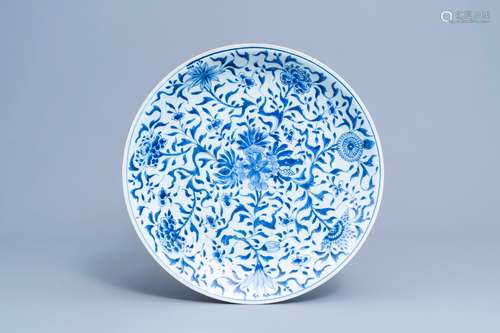 A Chinese blue and white charger with floral design, Kangxi