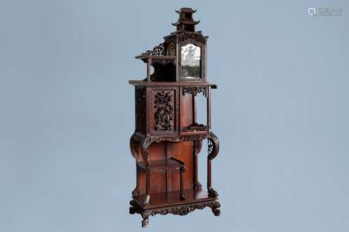 A Chinese reticulated wooden 'dragon' display cabinet, ca. 1...