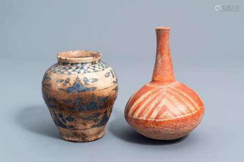 A South American bottle vase and a Syrian or Iranian storage...