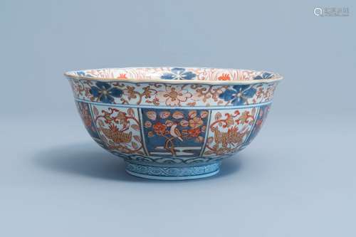 A Japanese Imari bowl with birds among blossoming branches a...