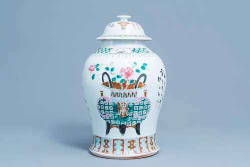 A Chinese famille rose vase and cover with flower baskets, 1...