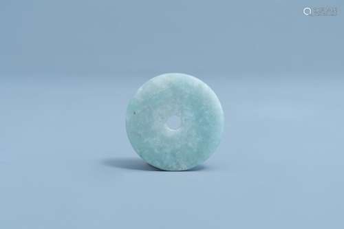 A Chinese pale celadon jade bi disc, 19th/20th C.