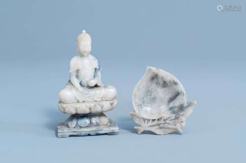 A Chinese soapstone figure of Buddha and a peach shaped brus...