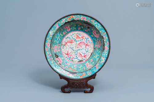 A Chinese Canton enamel bowl with fish and floral design, 19...