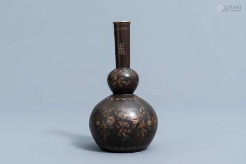 A Chinese or Vietnamese silver and copper inlaid bronze vase...