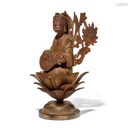 A rare and important model of a Celestial Musician from the ...