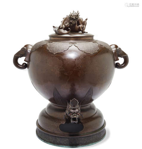 A massive inlaid bronze ewer