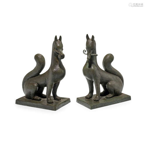 A PAIR OF BRONZE FOXES