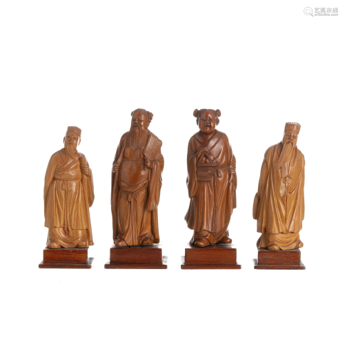 Four Chinese wooden scholar and immortal figures