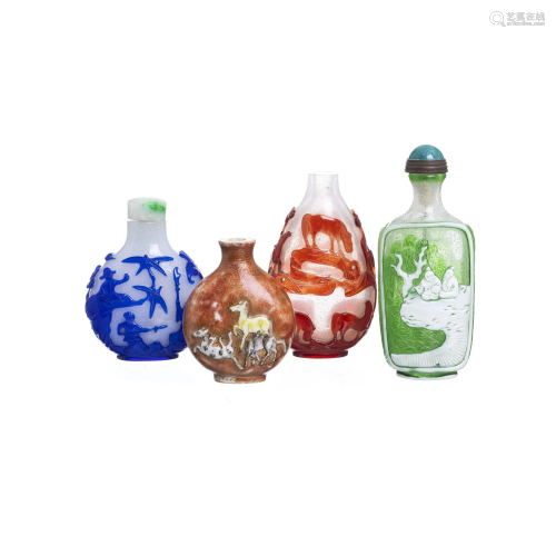 Four Chinese overlay snuff bottles