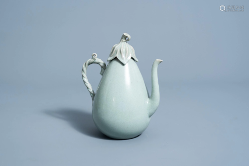 An exceptional Korean celadon glazed ewer and cover,