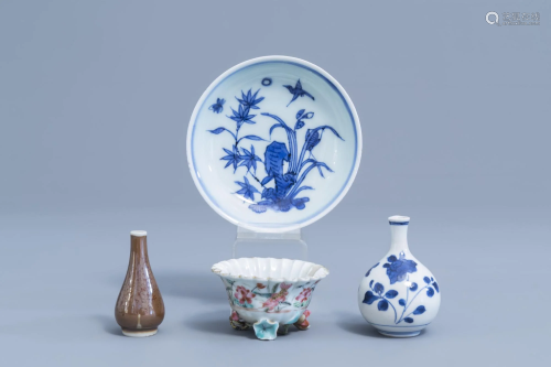 A Chinese blue and white saucer with floral design, a