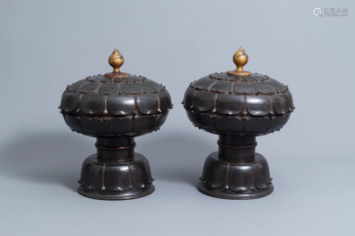 A pair of lotus-shaped gilt-lacquered wood 'tenong' or