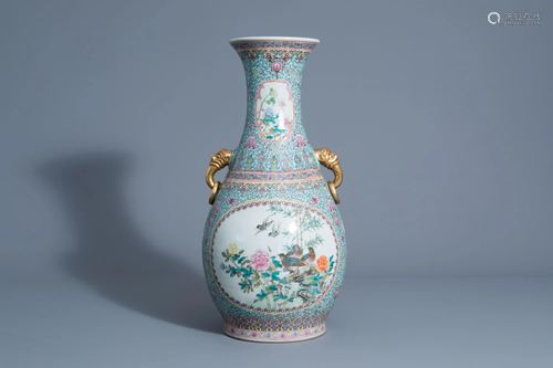 A Chinese famille rose vase with birds among blossoming