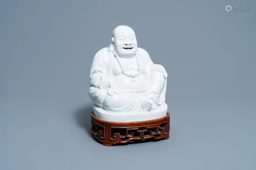 A Chinese Dehua blanc de Chine figure of Buddha,