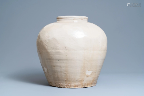 A large Chinese monochrome cream-glazed bulbous vase,