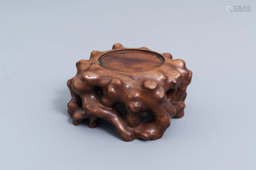 A Chinese naturalistically carved wooden stand,