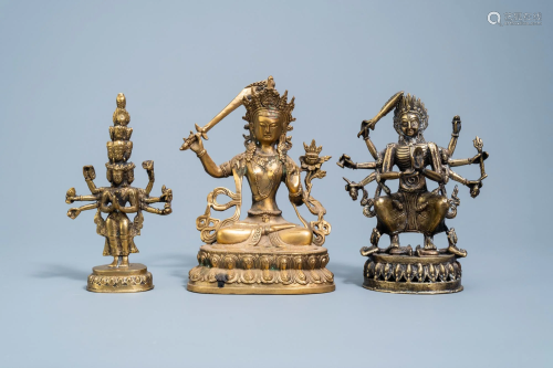Three Sino-Tibetan bronze figures of deities, 19th/20th