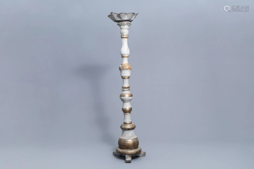 An Italian polychrome decorated wood candlestick,