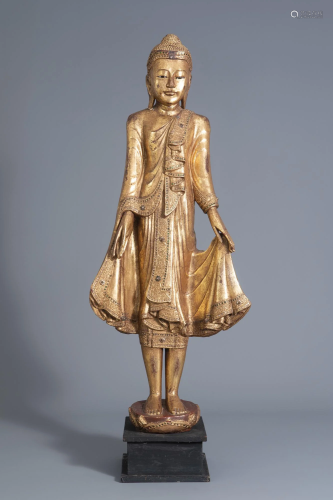 A Thai gilt lacquered standing Buddha figure, 19th/20th