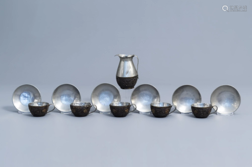 A Chinese 12-piece service of pewter mounted carved
