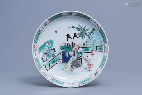 A Chinese famille verte charger with ladies and boys on