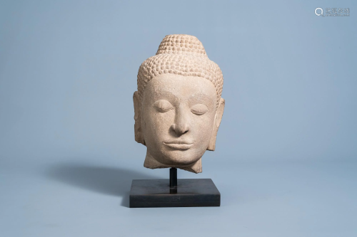 A Thai stone Buddha head, Ayutthaya kingdom, Siam,