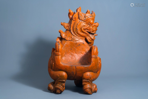 A Tibetan carved wooden 'dragon' chair, 19th/20th C.