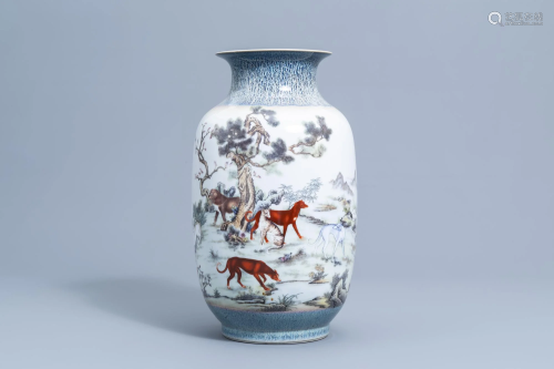 A Chinese polychrome vase with dogs in a landscape,