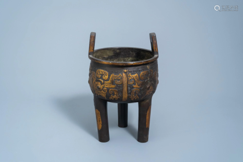 A Chinese parcel-gilt bronze tripod censer, Ming
