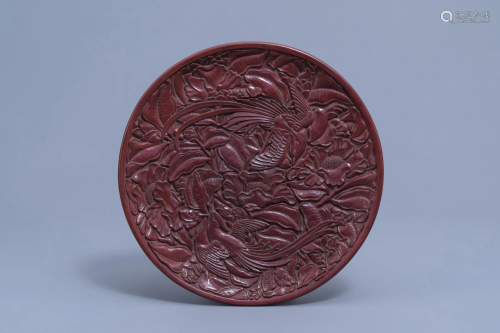 An inscribed Chinese red lacquered charger with birds