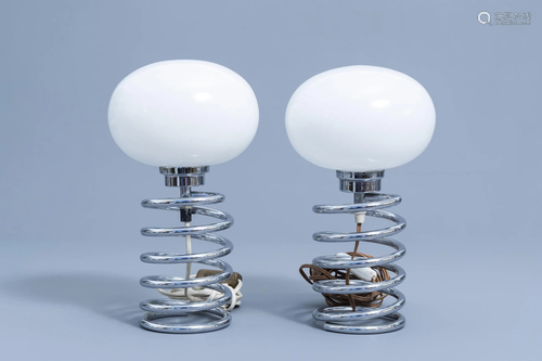 A pair of chromed metal spiral table lamps, presumably