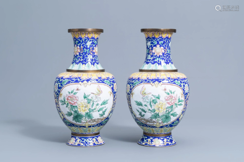 A pair of Chinese baluster shaped Canton enamel vases