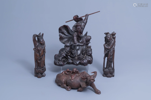 Four various Chinese carved wooden figures, 20th C.