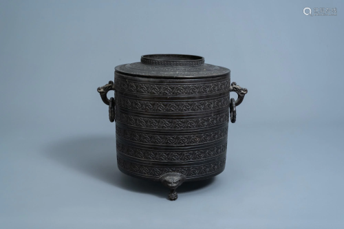 A Chinese bronze tripod censer and cover, Ming/Qing