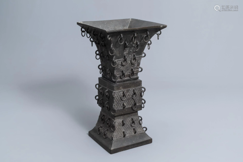 A large quadrangular Chinese bronze 'gu' vase with