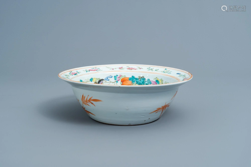 A Chinese famille rose bowl with a qilin and figures in