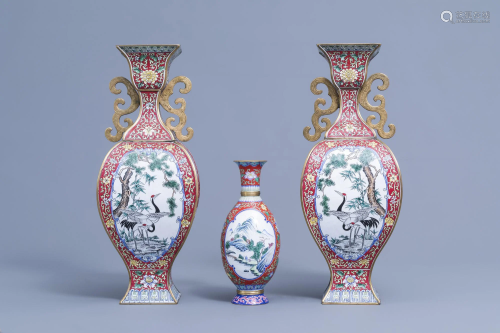 A pair of Chinese baluster shaped Canton enamel vases