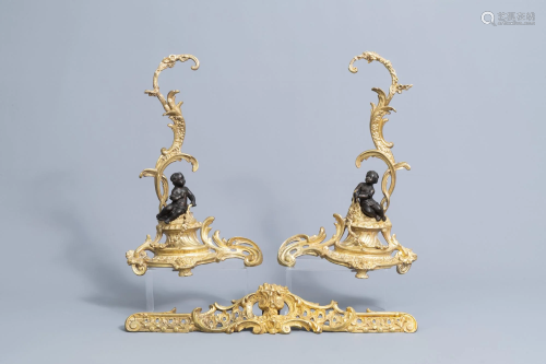 A pair of French Louis XV style patinated and gilt