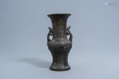 A Chinese bronze archaic relief-decorated vase with
